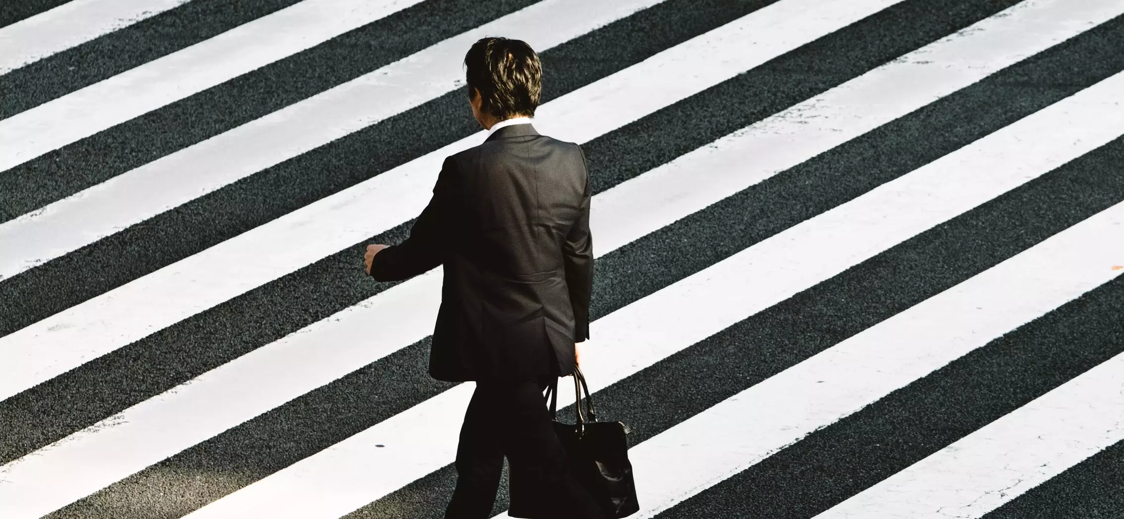 a-man-cross-the-street